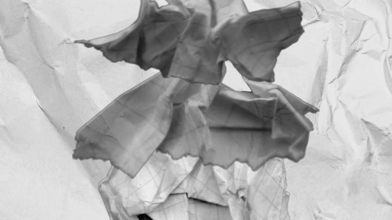 Dynamic Crumpled Paper Texture Animation with Color Transitions