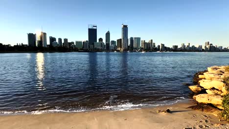 perth city skyline with skyscrapers over the swan river in western australia