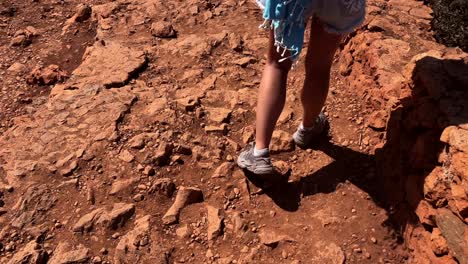 hiker on rugged path balos lagoon crete greece