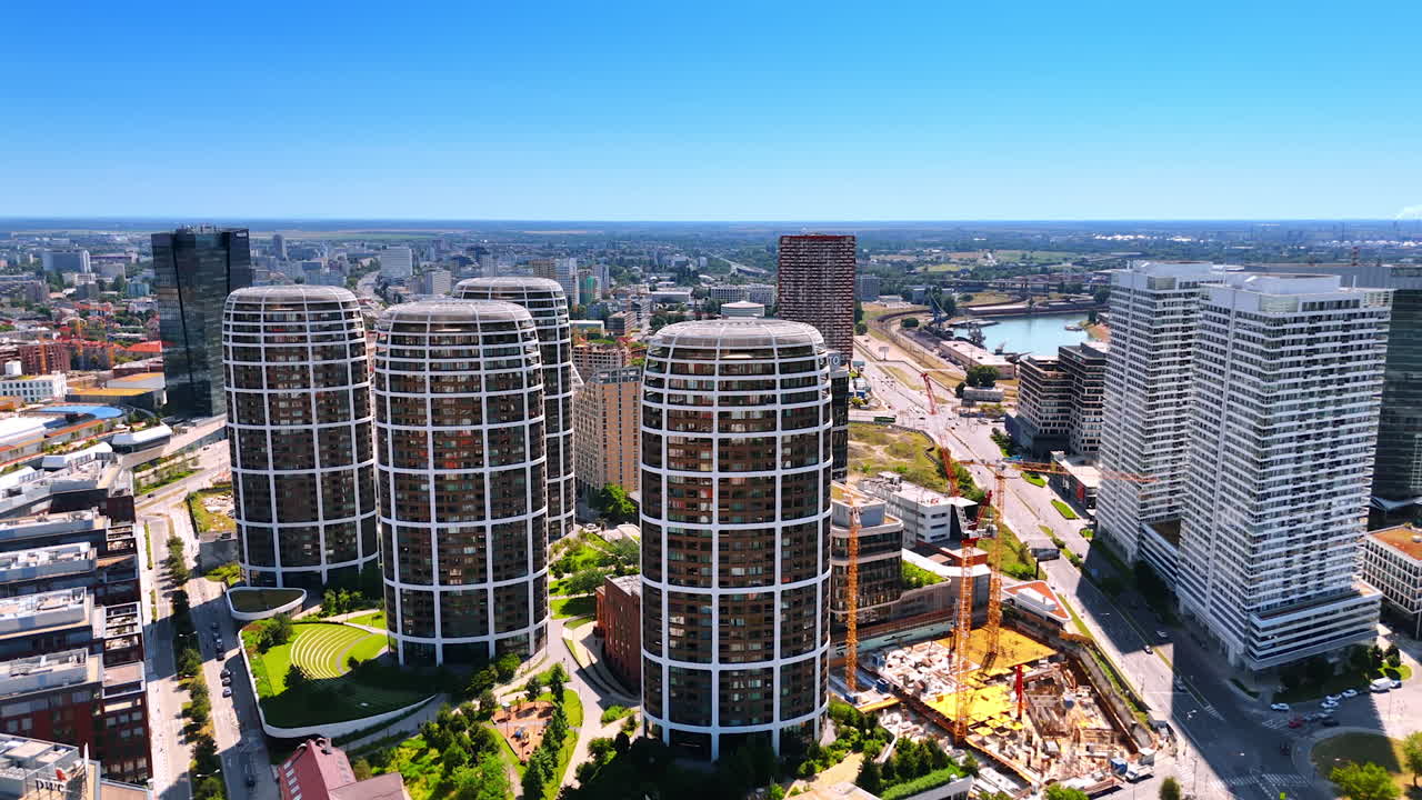 Four similar towers of unusual design near the construction site. Aerial perspective on the Sky-Park Bratislava, Slovakia from aerial view.