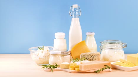 assorted dairy items displayed on wooden surface