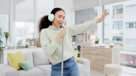 music, singing and woman dance with broom