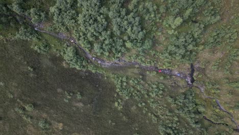 Aerial-Top-Down-of-People-walking-on-a-Trail-on-Vikafjell,-Norway