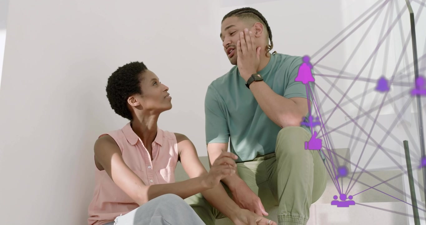Woman raising hand while explaining network concept to man, animated purple nodes appearing