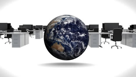 globe rotating against black and white office