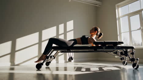 woman doing pilates exercise