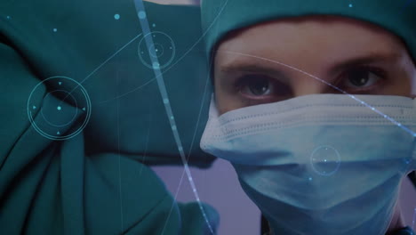 animation of network of connections with shapes over caucasian female surgeon during surgery