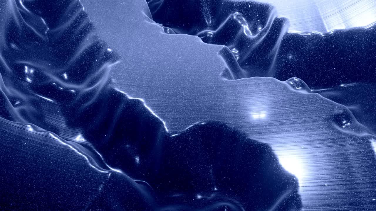 Stylish festive black bg. Fantastical abstract looped background, waves move on glossy surface like landscape made of liquid blue wax with sparkles. Beautiful soft background with smooth animation 4k