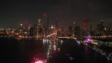 drone shot of the chicago skyline, during fourth of july night celebration