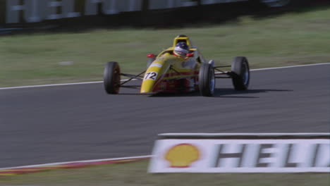 a formula car drives on a circuit track 3