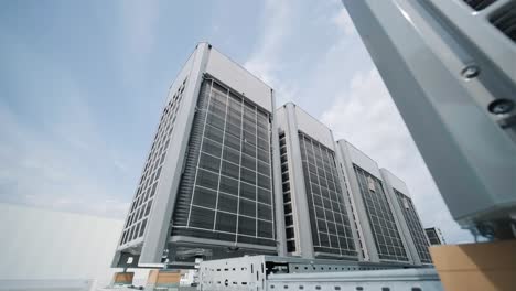 the air conditioning and ventilation system of a large industrial facility is located on the roof. it includes an air conditioner, smoke exhaust, and ventilation.