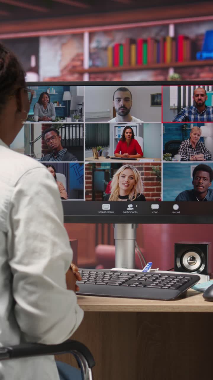 Vertical video Remote employee in home office saluting colleagues during online videocall