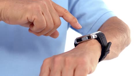 man using his smartwatch