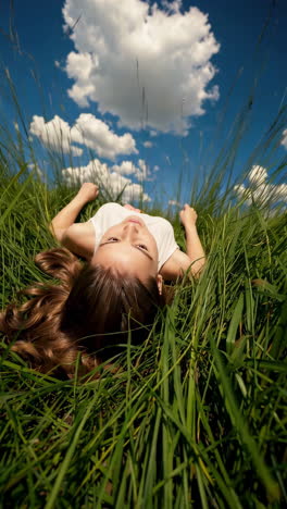 woman relaxing in a field