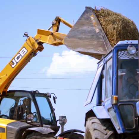 loading hay on the trailer