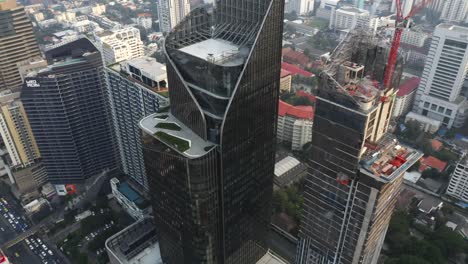 flying around skyscraper in bangkok