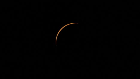 the last sliver of sunlight disappears as a total solar eclipse begins