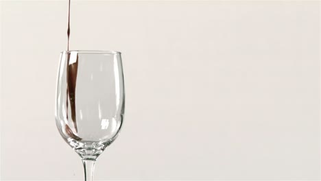 Red-wine-pouring-into-wine-glass