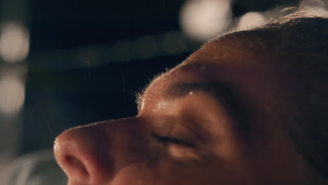 close up portrait beautiful young woman standing in rain enjoying gentle raindrops touching skin soothing emotions slow motion