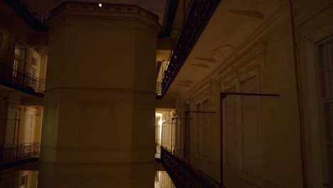 Dark-mysterious-mid-european-courtyard-pov-during-nighttime