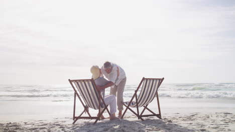 a-happy-mature-couple-relaxing-on-chairs