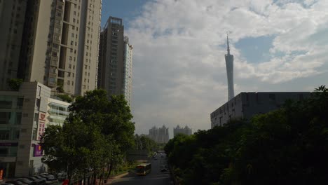sunny evening time guangzhou city downtown traffic street tower slow motion panorama 4k china