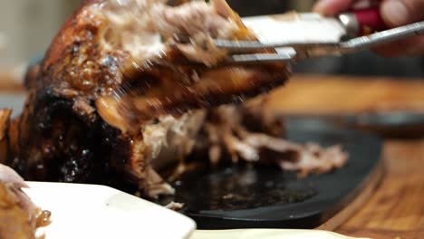 family dad is cutting turkey for christmas closeup