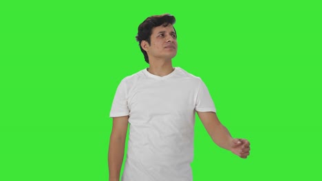 Disturbed-Indian-man-flying-a-bee-Green-screen