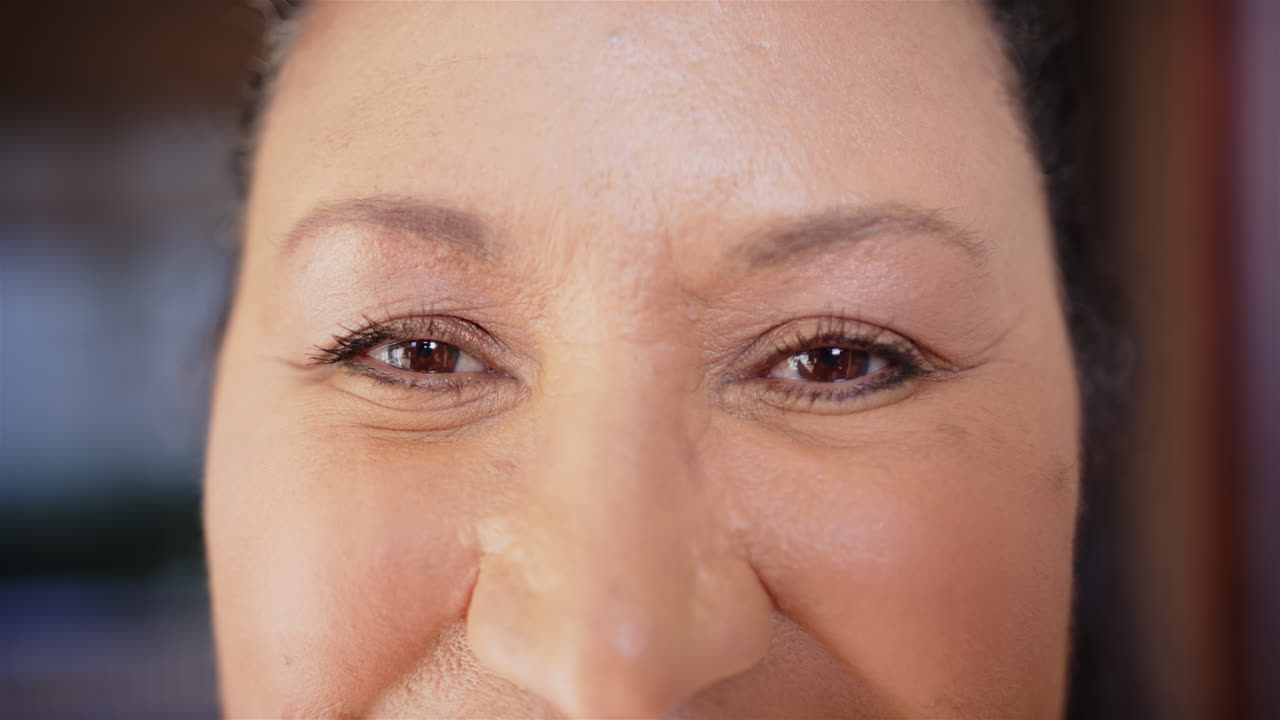 Close-up of woman's eyes and nose, showing natural beauty and confidence