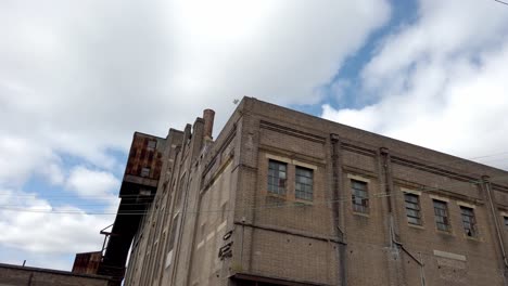 exterior of the abandoned power station in balmain, sydney, nsw, australia - low angle shot