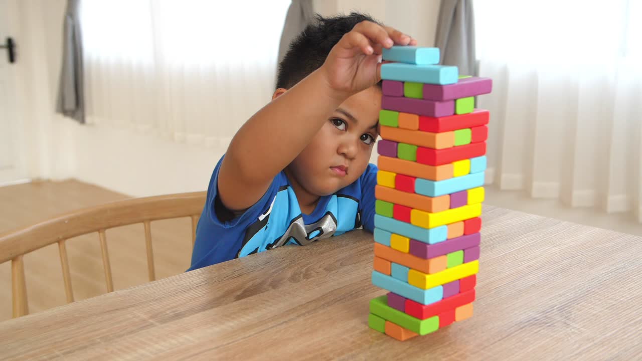 Happy Boy Play Wood Block Tower Game, Slow Motion