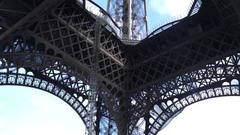 eiffel tower under renovation in paris, france