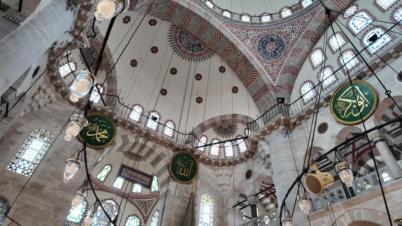 Ornate Interior Dome and Lamps of a Grand Mosque