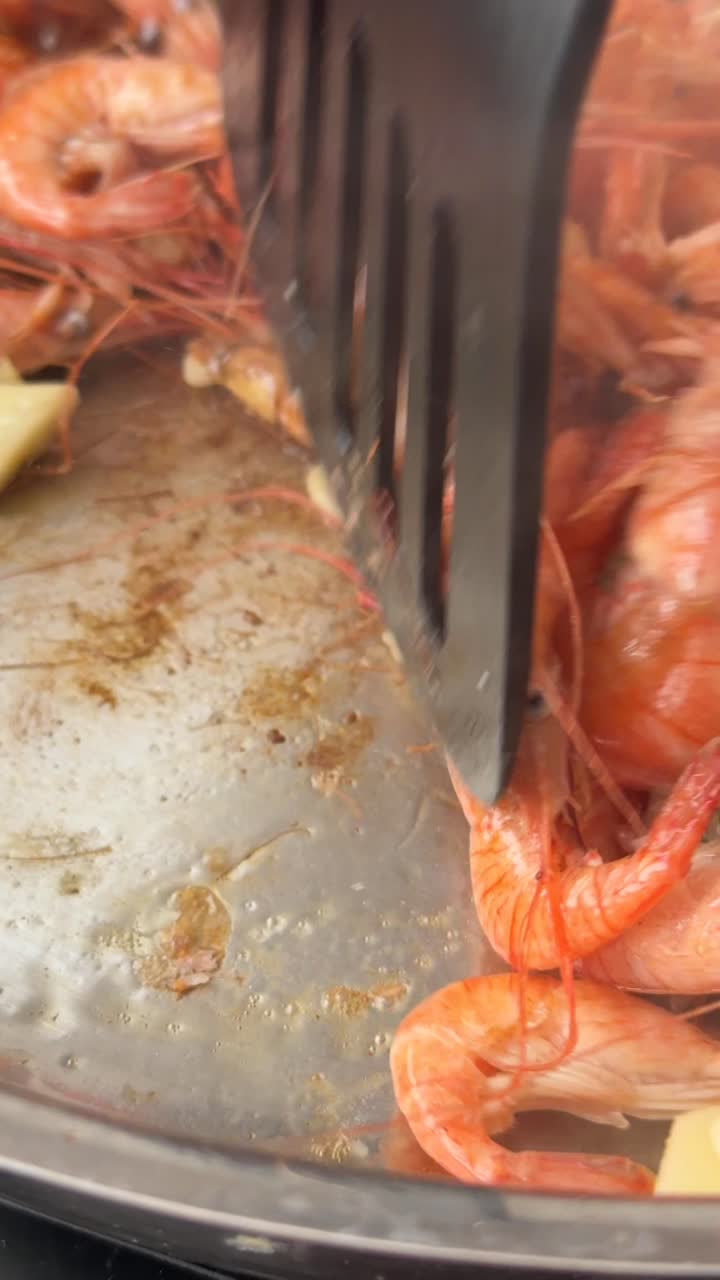 Close-Up of Shrimp and Garlic Frying in a Hot Pan