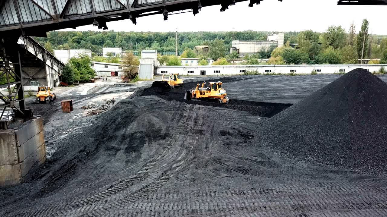 Aerial view of coal pile of a power plant. Extractive industry, anthracite.