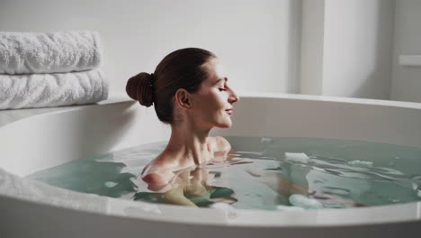 woman relaxing in an ice bath