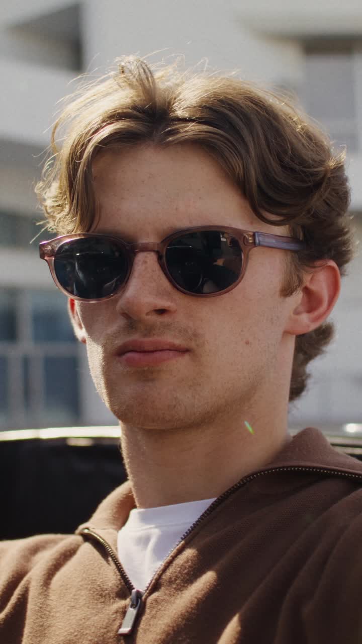 Young Man Wearing Sunglasses