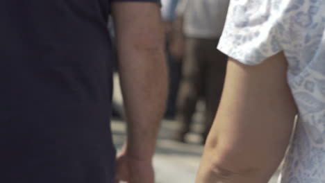 close-up of crowd of people walking on the street