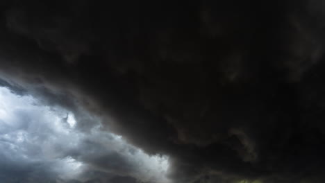the sky turns dark as clouds swirl in this 4k timelapse scene