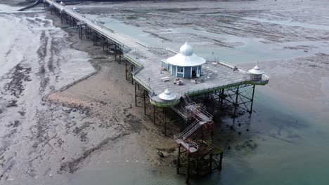 Bangor-Garth-pier-Victorian-ornamental-silver-dome-pavilion-landmark-tourist-aerial-slow-descend-tilt-up-view-push-in