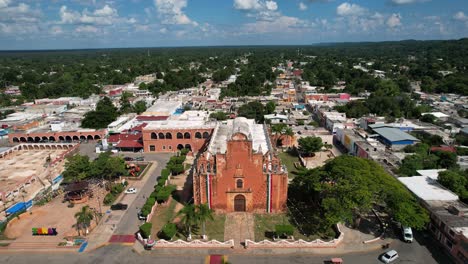 elevation drone shot of tekax yucatan mexico main church at midday