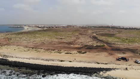 Aerial-View-Of-Waves-Breaking-At-Ponte-Preta-Coastline-Beach-At-Cape-Verde