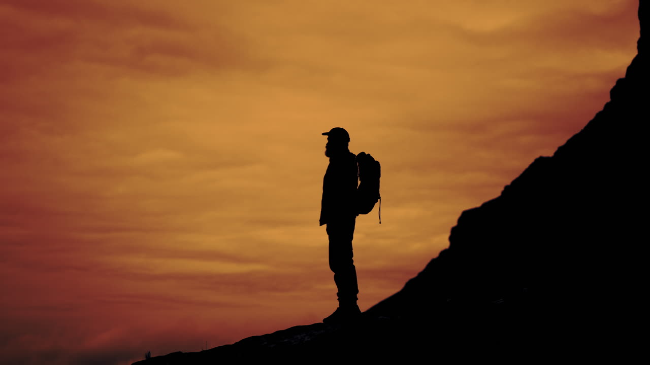 Silhouette of a Hiker at Sunset