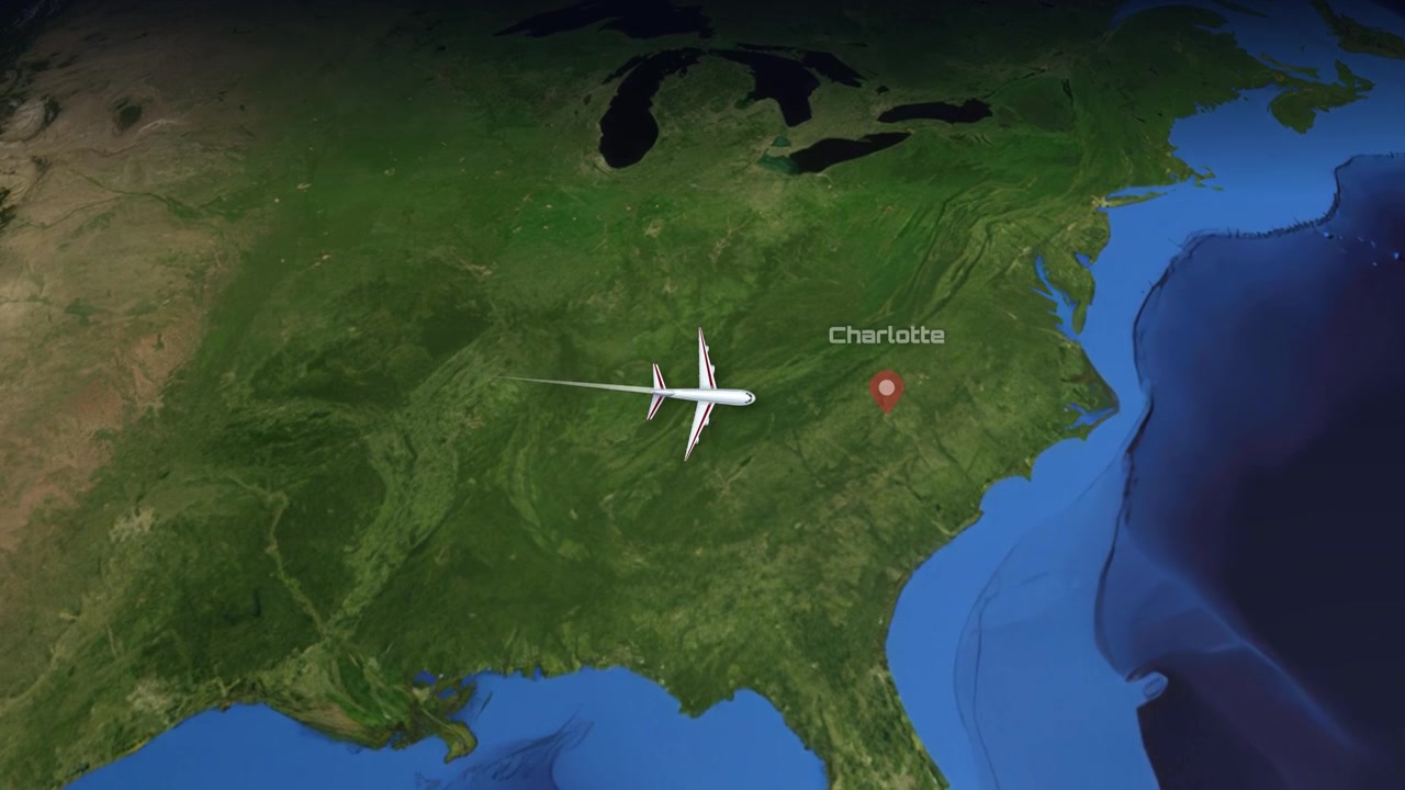 Satellite view animation follows a commercial airplane flying from Los Angeles to Charlotte, North Carolina