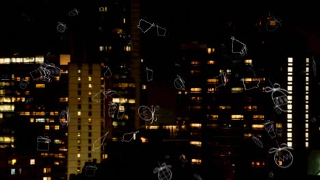 animation of falling christmas icons over cityscape