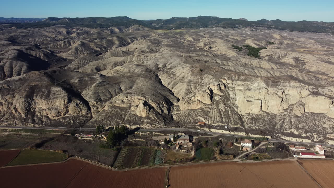 Aerial view of a dry, mountainous landscape in Spain