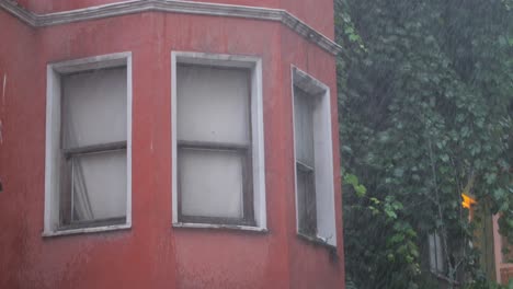 old red building in rain