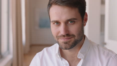 portrait attractive man smiling confident independent male in apartment home