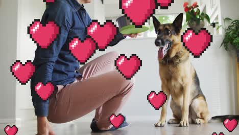 animation of red heart icons over caucasian woman with pet dog