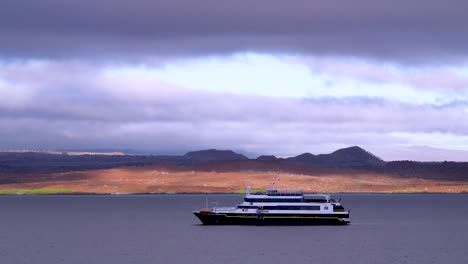 a boat is moored off the galapagos islands